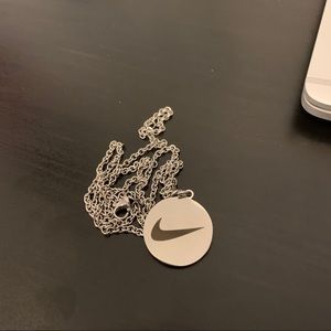 nike-like swoosh necklace